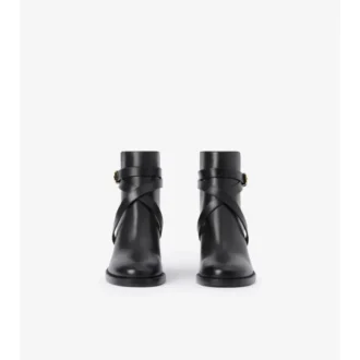 Botas de tacón con estampado de cuadros y cuero Botas de tacón con estampado de cuadros y cuero