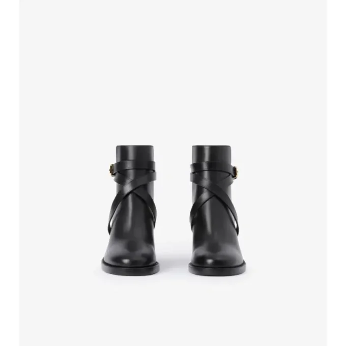 Botas de tacón con estampado de cuadros y cuero Botas de tacón con estampado de cuadros y cuero