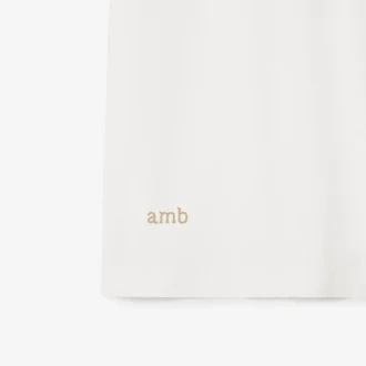 Camisas de algodón con logotipo en el cuello