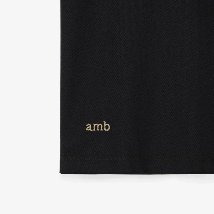 Camisas de algodón con logotipo en el cuello Camisas de algodón con logotipo en el cuello