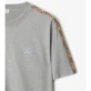 Camiseta de algodón con ribetes a cuadros Camiseta de algodón con ribetes a cuadros