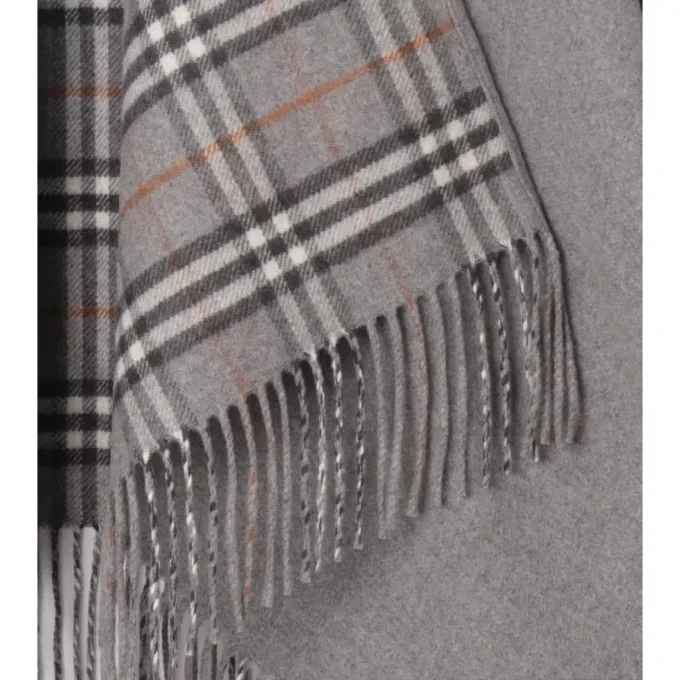 Capa reversible de lana a cuadros