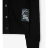 Cardigan de lana con etiqueta de cuadros Cardigan de lana con etiqueta de cuadros