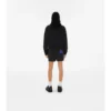 Chaqueta corta con capucha de nylon