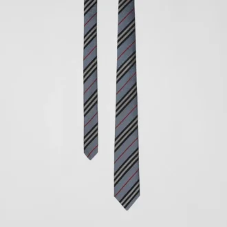 Corbata de seda con rayas icónicas de corte clásico Corbata de seda con rayas icónicas de corte clásico