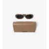 Gafas de sol ovaladas con estampado de cuadros