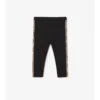 Leggings de nailon con ribetes de cuadros Leggings de nailon con ribetes de cuadros