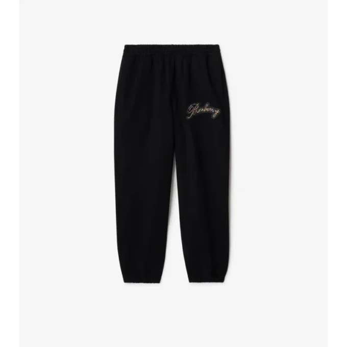 Pantalones de jogging de algodón con logotipo cursivo de cuadros Pantalones de jogging de algodón con logotipo cursivo de cuadros