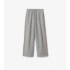 Pantalones deportivos de algodón con ribetes de cuadros Pantalones deportivos de algodón con ribetes de cuadros