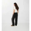 Pantalones deportivos de algodón con ribetes de cuadros Pantalones deportivos de algodón con ribetes de cuadros
