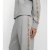 Pantalones deportivos de algodón con ribetes de cuadros Pantalones deportivos de algodón con ribetes de cuadros