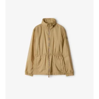 Parka corta de nailon con cinta a cuadros